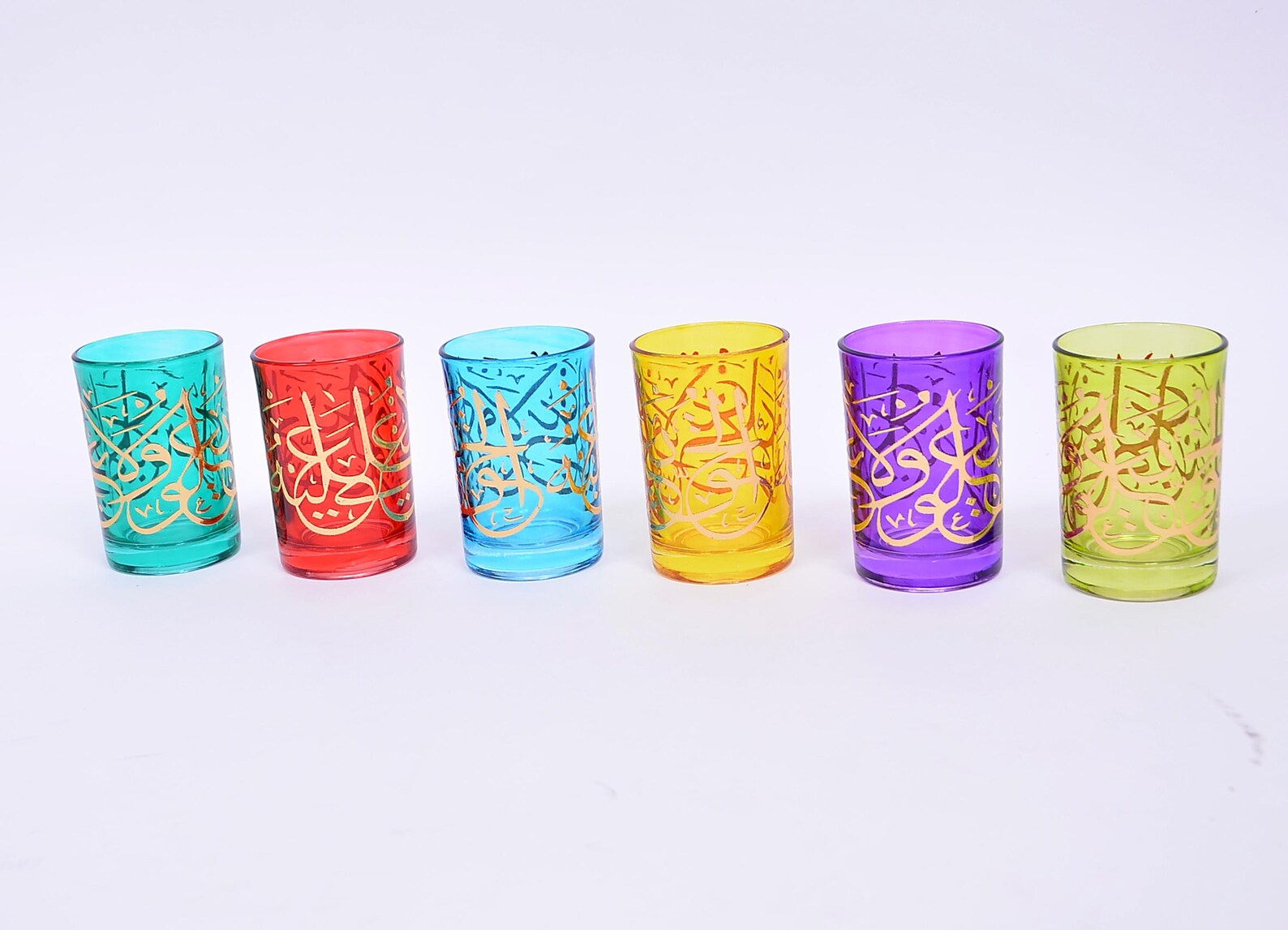 Moroccan Calligraphed Glasses – “الحق يعلو ولا يعلى عليه” in Gold (Set of 6 Colors)